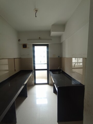 Kitchen in 1.5 BHK Apartment at Lodha Palava City Lakeshore Greens, Dombivli East – for Sale