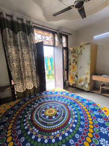 Bedroom in 2 BHK Builder Floor at Vasundhara Sector 1 – for Rent