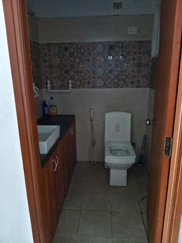 Bathroom in 1 BHK Apartment at Paramount Golfforeste, Zeta I Greater Noida – for Rent