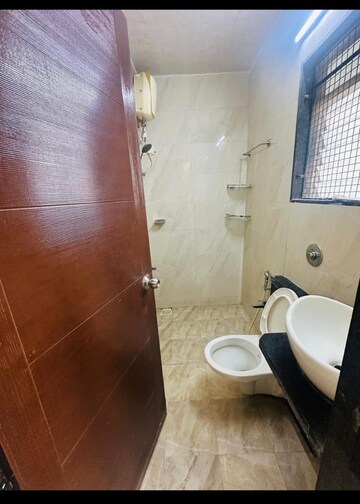Bathroom in 1 BHK Apartment at Swaraj Kalash, Chembur – for Rent