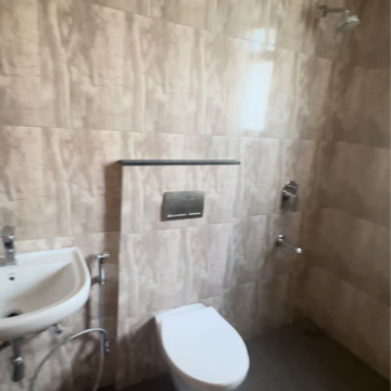 Bathroom in 3 BHK Apartment at Shapoorji Pallonji Joyville Gurgaon, Sector 102a – for Rent