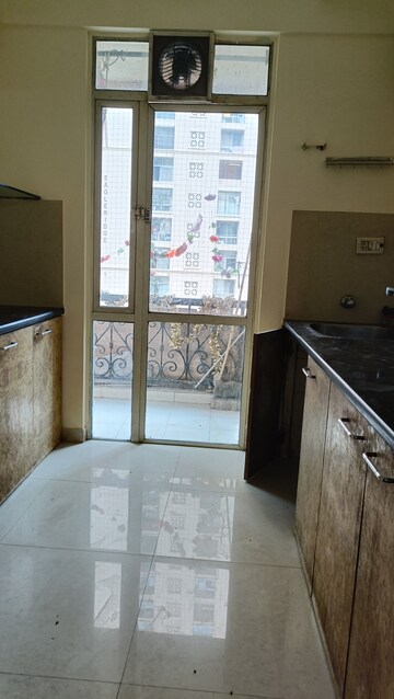 Kitchen in 1 BHK Apartment at Hiranandani Estate Flora, Ghodbunder Road – for Rent