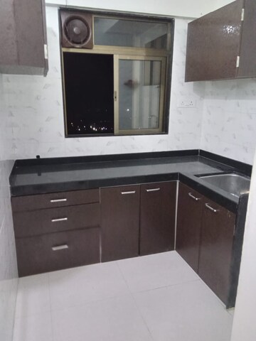 Kitchen in 1 BHK Apartment at Chandak Nishchay Wing A, Borivali East – for Rent