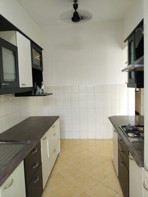 Kitchen in 3 BHK Apartment at Lodha Woods, Kandivali East – for Sale