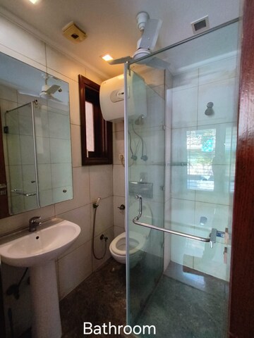 Bathroom in 3 BHK Builder Floor at Green Park Extension – for Rent