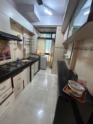 Kitchen in 3 BHK Apartment at Oberoi Realty Gardens, Kandivali East – for Sale