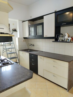 Kitchen in 3 BHK Apartment at Oberoi Realty Gardens, Kandivali East – for Sale