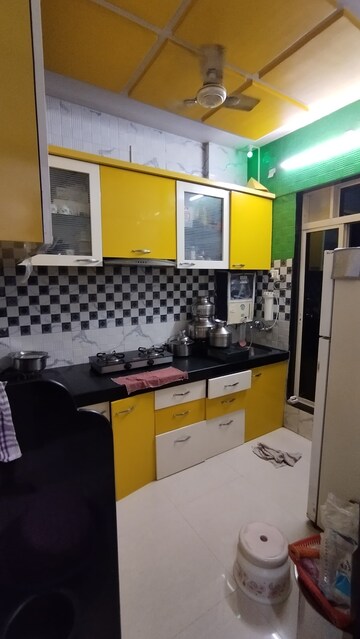 Kitchen in 2 BHK Apartment at Millenium Arcade CHS, Dombivli West – for Rent