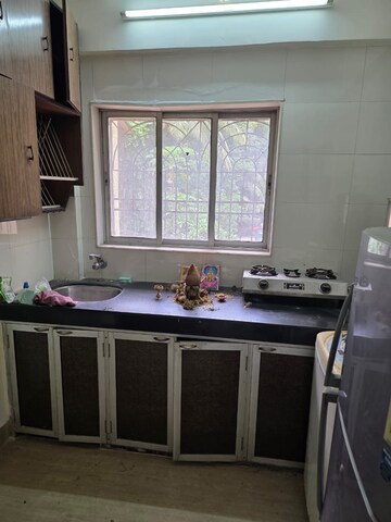 Kitchen in 1.5 BHK Apartment at Kamla Airbus, Andheri East – for Rent
