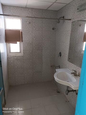 Bathroom in 3 BHK Apartment at Omaxe Palm Greens Villas, Mu Greater Noida – for Sale