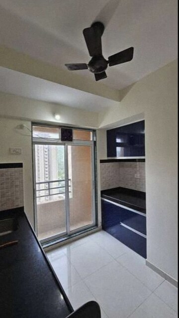 Kitchen in 1 BHK Apartment at Damji Shamji Mahavir Kalpavruksha Wing J Phase 2, Kasarvadavali – for Rent
