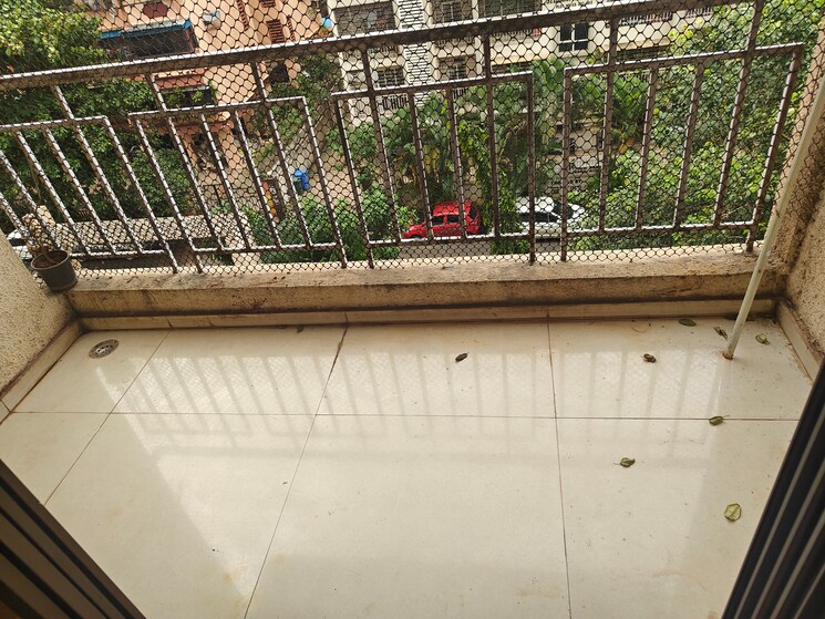 Balcony, om-prabhu-manohar-chs 2 Bedroom 1120 Sq.Ft. Apartment In Seawoods Sector 50 Navi Mumbai 8940039