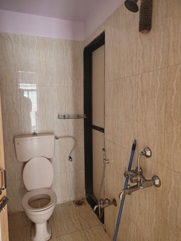 Bathroom in 2 BHK Apartment at Om Prabhu Manohar CHS, Seawoods Sector 50 – for Rent