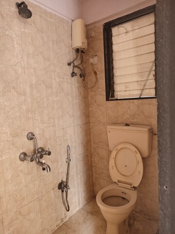 Bathroom in 2 BHK Apartment at Om Prabhu Manohar CHS, Seawoods Sector 50 – for Rent