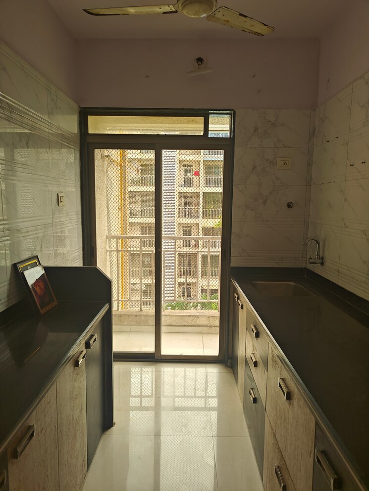 Kitchen, om-prabhu-manohar-chs 2 Bedroom 1120 Sq.Ft. Apartment In Seawoods Sector 50 Navi Mumbai 8940039