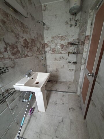 Bathroom in 2 BHK Apartment at Bandstand Apartment, Bandra West – for Rent