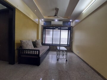 Living Room in 1 BHK Apartment at Vrindavan CHS Goregaon, Goregaon East – for Rent