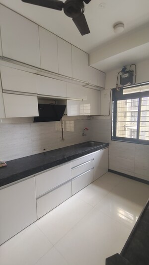 Kitchen in 3 BHK Apartment at Acme Ozone, Manpada – for Sale