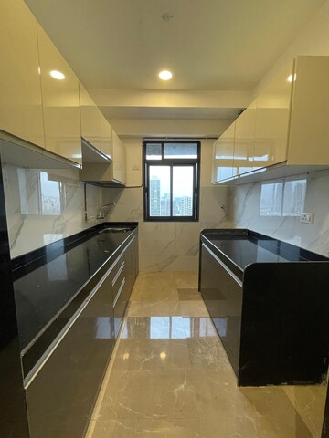 Kitchen in 2 BHK Apartment at Dev Leo Tower, Oshiwara – for Sale
