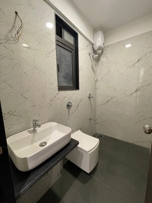 Bathroom in 2 BHK Apartment at Dev Leo Tower, Oshiwara – for Sale