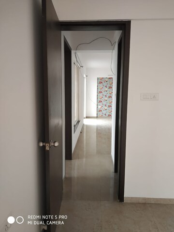 Building Lobby in 2 BHK Apartment at Royal Orange County, Rahatani – for Rent