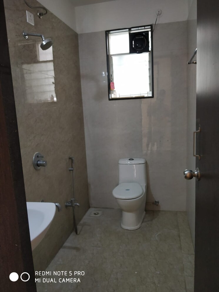 Bathroom, royal-orange-county 2 Bedroom 850 Sq.Ft. Apartment In Rahatani Pune 8940280