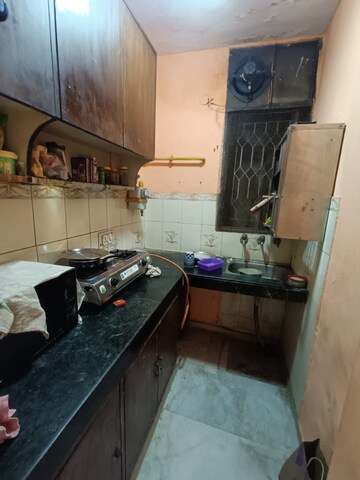 Kitchen in 2 BHK Builder Floor at Khirki Extension – for Rent