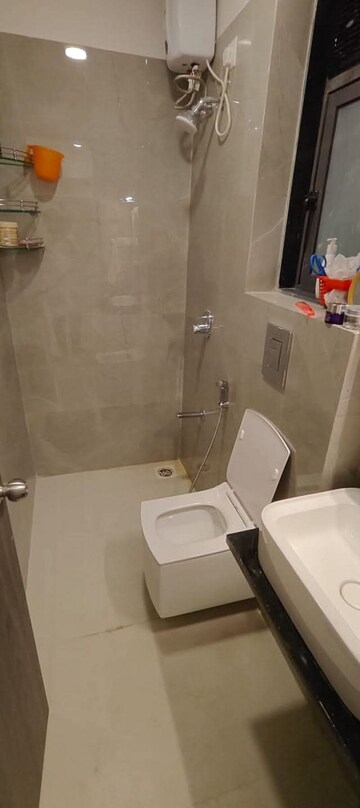 Bathroom in 2 BHK Apartment at Dev Leo Tower, Oshiwara – for Rent