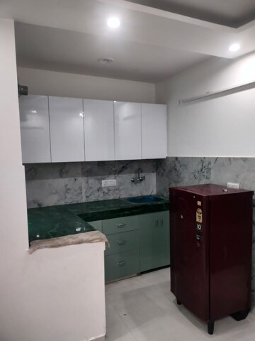 Kitchen in 2 BHK Builder Floor at Khirki Extension – for Rent