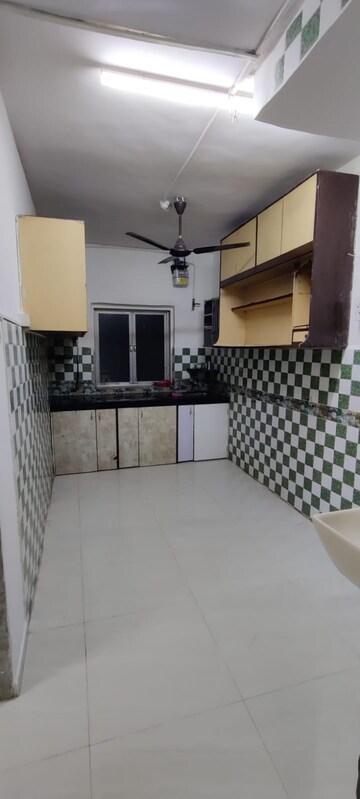Kitchen in 2 BHK Apartment at Gokuldham Complex, Goregaon East – for Rent