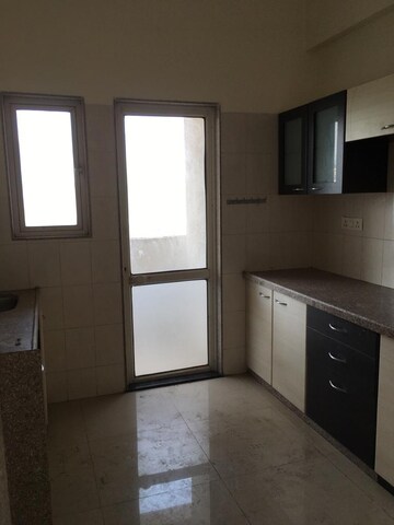 Kitchen in 2 BHK Apartment at Ruparel Ariana, Parel – for Rent