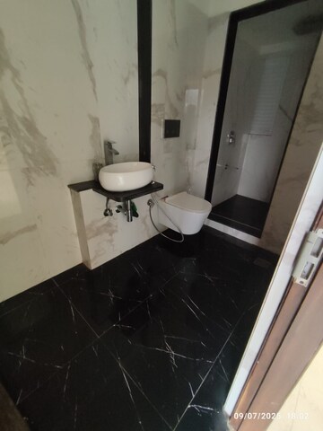 Bathroom in 2 BHK Apartment at Ruparel Ariana, Parel – for Rent