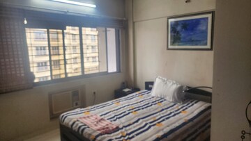 Bedroom in 2 BHK Apartment at Lemont Apartment, Malad East – for Rent