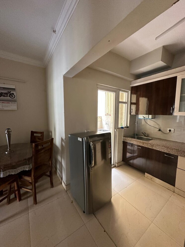 Kitchen, paras-tierea 2 Bedroom 925 Sq.Ft. Apartment In Sector 137 Noida 8940649