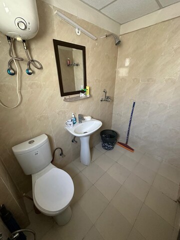 Bathroom in 2 BHK Apartment at Paras Tierea, Sector 137 – for Sale