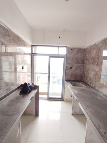 Kitchen in 2 BHK Apartment at KT Radhe Mohan, Kopar Khairane – for Rent