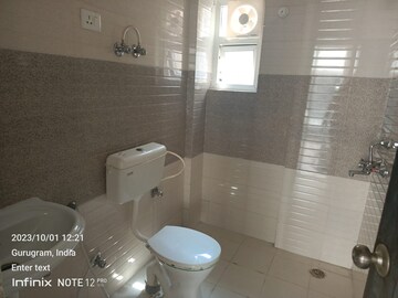 Bathroom in 2 BHK Apartment at Signature Global Grand Iva, Sector 103 – for Rent