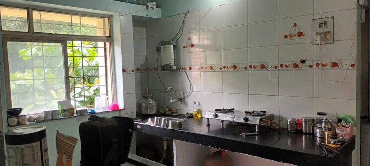 Kitchen, garden-view 1 Bedroom 600 Sq.Ft. Apartment In Dhanori Pune 8940792