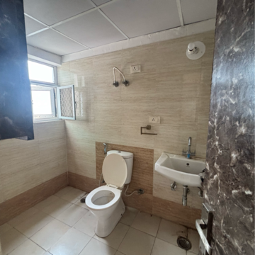 Bathroom in 2 BHK Apartment at Aditya Luxuria Estate, Shahpur Bamheta – for Rent