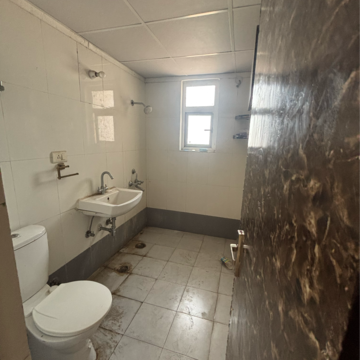 Bathroom in 2 BHK Apartment at Aditya Luxuria Estate, Shahpur Bamheta – for Rent