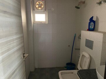 Bathroom in 3 BHK Apartment at Paradigm Business Hermitage Park, Dhakoli – for Sale