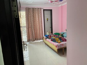 Bedroom in 3 BHK Apartment at Paradigm Business Hermitage Park, Dhakoli – for Sale