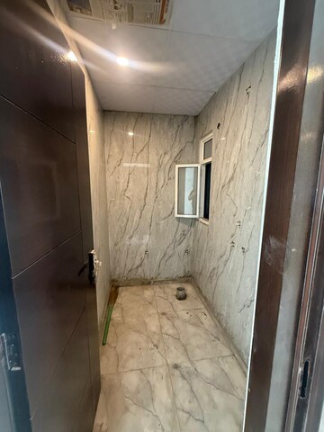 Bathroom in 3 BHK Apartment at Anant Dham Society, Sector 49 – for Sale
