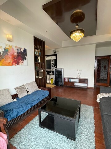 Living Room in 2.5 BHK Apartment at Mahagun Moderne, Sector 78 – for Rent