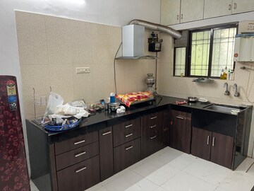Kitchen in 3.5 BHK Villa at SiddhiVinayak Shubhashree Woods, Pimple Saudagar – for Rent