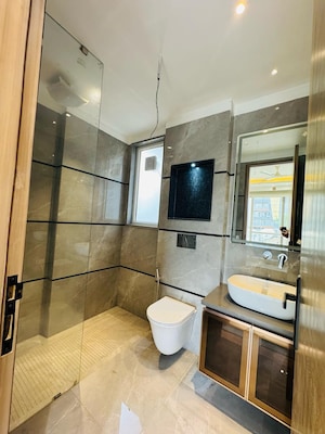 Bathroom in 4 BHK Builder Floor at Auram Floor, South City 2 – for Sale