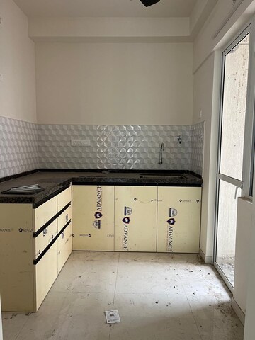 Kitchen in 2 BHK Apartment at Godrej Green Cove, Mahalunge – for Rent