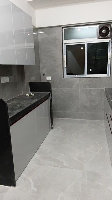 Kitchen in 2.5 BHK Apartment at Goregaon West – for Rent