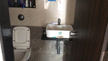 Bathroom in 1 BHK Apartment at Kalpavruksh Garden 1, Kandivali West – for Rent