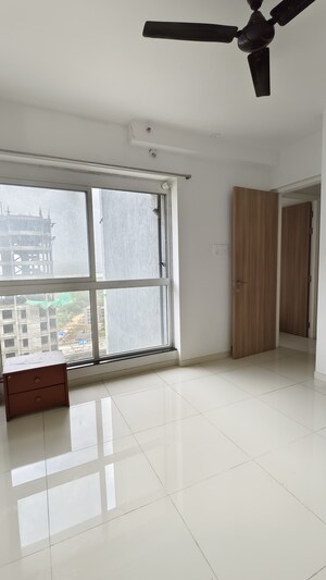 Master Bedroom in 1.5 BHK Apartment at Godrej Emerald, Ghodbunder Road – for Sale